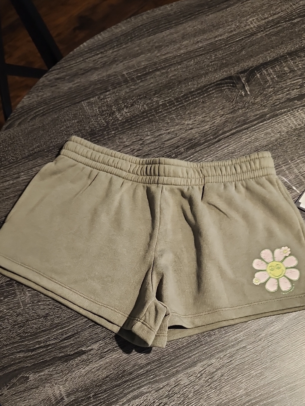 Grayson Threads Olive Green Athletic Shorts with Pink Flower Patch